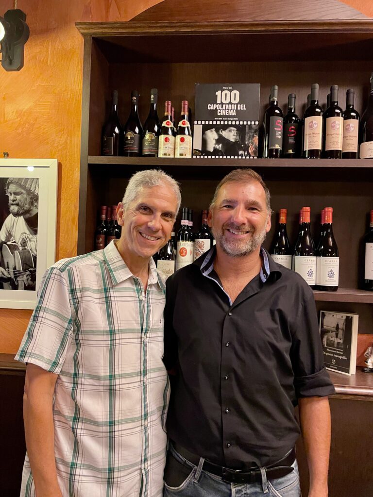 Driscoll with the owner of Ravenna restaurant in Italy (Photo Credit: Robert Driscoll) 