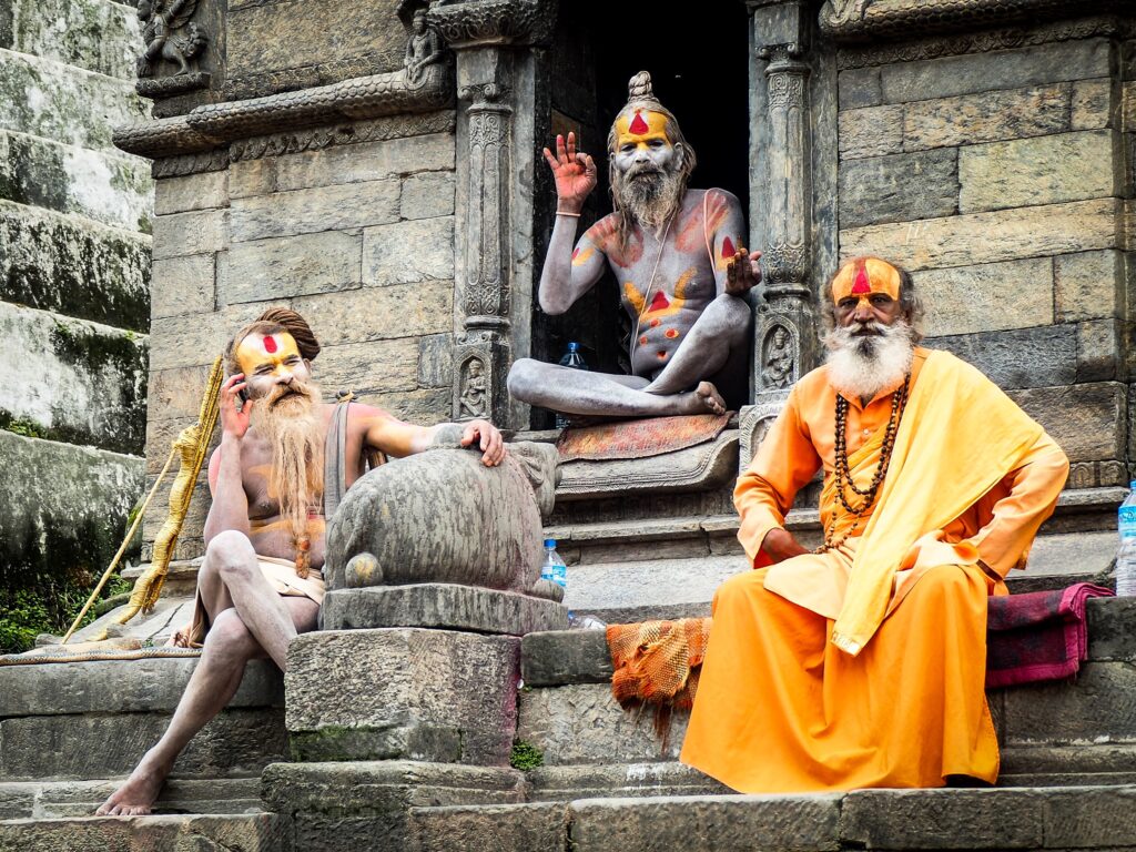 Three monks at Pashupatinath Temple (Photo Credit: fares nimri on Unsplash)