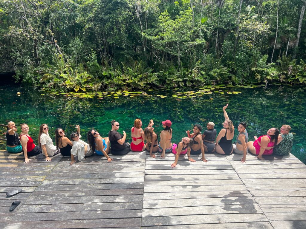 Queer women at a private cenote (Photo courtesy of Lindsay Cale)