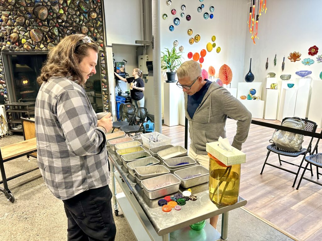 Jon Bailey's husband, Triton, chooses colors for for glassblowing experience at the Seattle Glassblowing Studio. (Photo Credit: Jon Bailey)