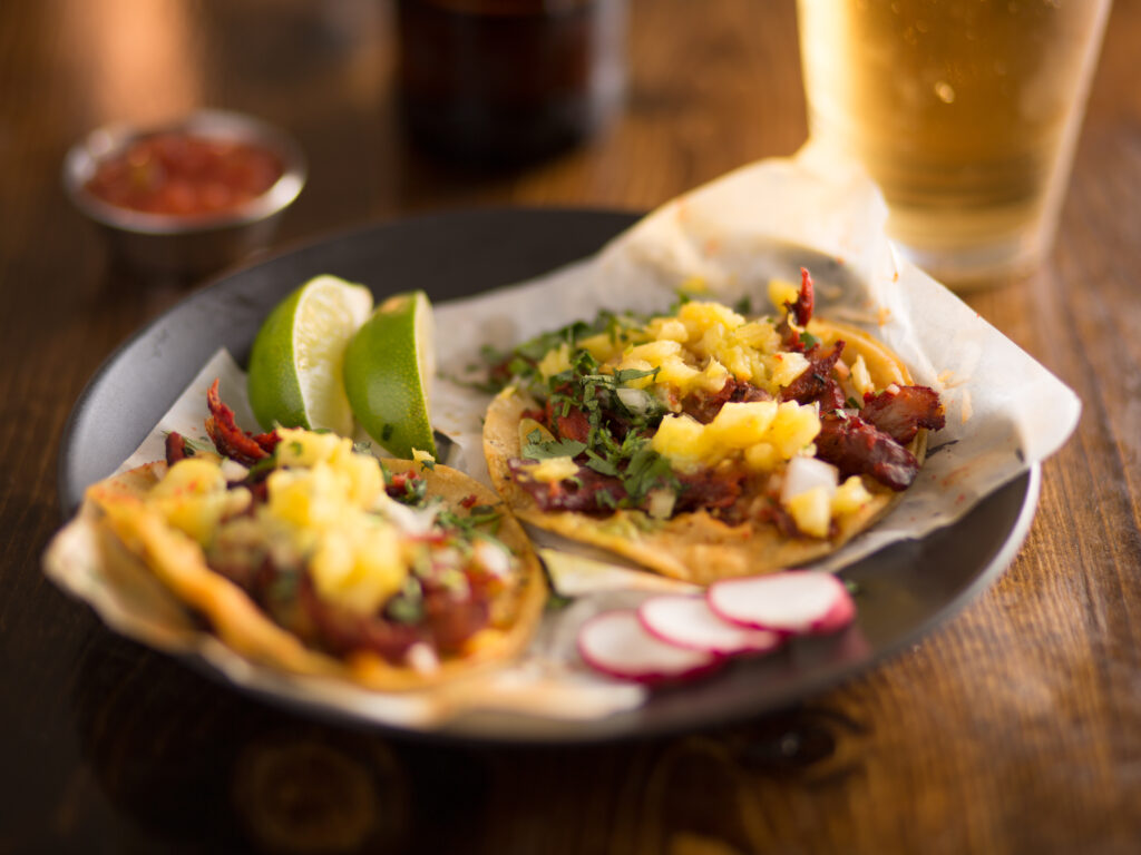 Tacos al Pastor (Photo Credit: Canva Pro)