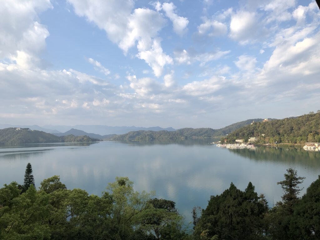 View of beautiful lake from balcony of a room at the Fleur de Chine Hotel (Photo Credit: Kwin Mosby)