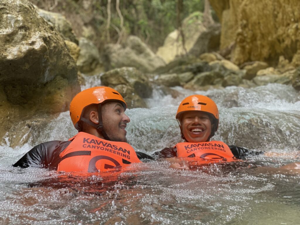 Will Luttrell and Jose Martinez canyoneering in Cebu, Philippines (Photo Credit: ProudlyNomadic @proudlynomadic)