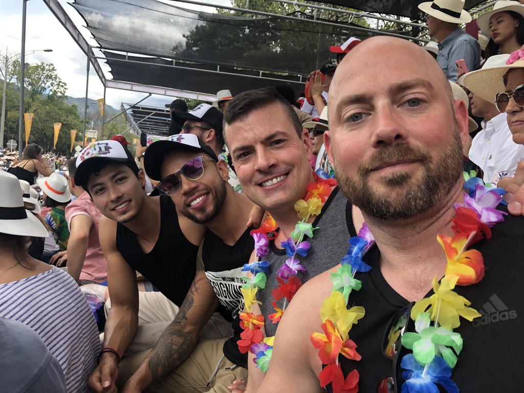 Peter Fortner (far right) with his husband Kurt Powers (second from right), and friends in Medellín, Colombia (Photo Credit: Peter Fortner)