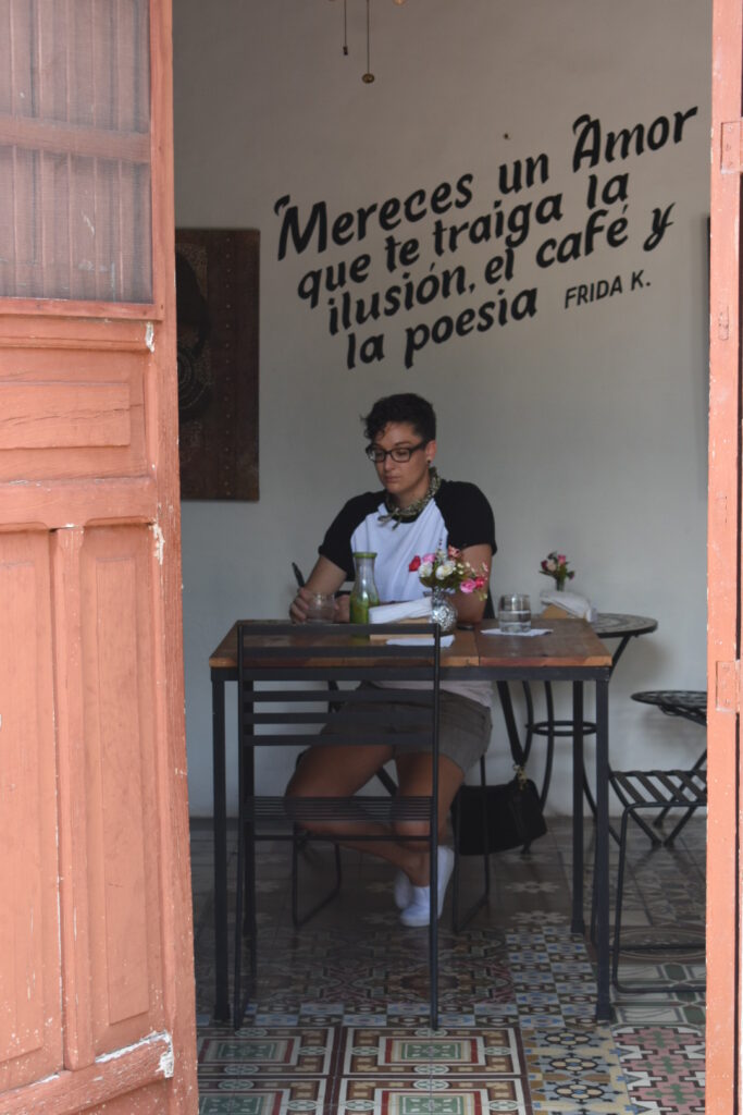 Lindsay Cale in a cafe in Merida, Mexico (Photo Credit: Lindsay Cale)