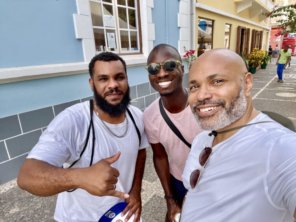 A local guide, David, shows us around Praia, Santiago, including a vendor at a local market that serves the best lunch in town! (Photo Credit: Kwin Mosby)